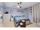Serene bedroom with a ceiling fan, soft blue walls and comfortable furniture at 5400 Roswell Rd # Apt L6, Sandy Springs, GA 30342