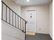 Close-up of a secure entry door with a unique door knocker and carpeted landing at 5400 Roswell Rd # Apt L6, Sandy Springs, GA 30342