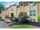 Inviting exterior of the complex with well-maintained landscaping and a classic brick facade at 5400 Roswell Rd # Apt L6, Sandy Springs, GA 30342