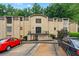 Well-maintained apartment building featuring manicured grounds, reserved parking, and classic architectural design at 5400 Roswell Rd # Apt L6, Sandy Springs, GA 30342