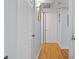 Hallway with wood floors, neutral walls, and bright lighting showcasing the home's layout at 5400 Roswell Rd # Apt L6, Sandy Springs, GA 30342