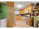 Efficient kitchen featuring classic cabinets, white appliances, and ample counter space at 5400 Roswell Rd # Apt L6, Sandy Springs, GA 30342
