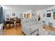 Open-concept living area with modern sofa and dining space, perfect for entertaining at 5400 Roswell Rd # Apt L6, Sandy Springs, GA 30342