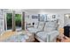 Relaxing living room with comfortable seating and easy access to the outdoors at 5400 Roswell Rd # Apt L6, Sandy Springs, GA 30342