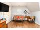 Comfortable bedroom seating area featuring an ornate sofa and wood floors at 5936 Millstone Ln, Stone Mountain, GA 30087