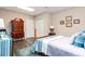 Cozy bedroom featuring wood floors, and complementing furniture and décor at 5936 Millstone Ln, Stone Mountain, GA 30087