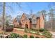 Charming brick home with manicured landscaping and a welcoming entrance in a peaceful setting at 5936 Millstone Ln, Stone Mountain, GA 30087