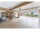 Spacious garage featuring ample storage and an open door with a view of the home's exterior at 5936 Millstone Ln, Stone Mountain, GA 30087