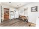Eat-in kitchen with matching table and chairs, wood-look floors and neutral colors at 5936 Millstone Ln, Stone Mountain, GA 30087