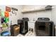 Functional laundry room equipped with modern appliances and ample storage at 5936 Millstone Ln, Stone Mountain, GA 30087