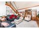 Inviting living room features hardwood floors, comfortable seating, and a stylish staircase at 5936 Millstone Ln, Stone Mountain, GA 30087