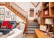 The staircase in this home features beautiful wood and leads to the upper level at 5936 Millstone Ln, Stone Mountain, GA 30087