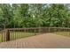 Spacious backyard deck perfect for entertaining with a view of the lawn at 170 Hidden Pines Dr, Covington, GA 30016