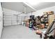 View of the spacious two car garage, with shelves and room for storage at 1730 Dahlia Dr, Cumming, GA 30040