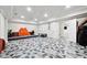 Spacious living room featuring tiled floors and two entry ways with room for many activities at 1730 Dahlia Dr, Cumming, GA 30040