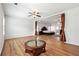 Open-concept main bedroom with decorative rug and elegant furnishings throughout at 1730 Dahlia Dr, Cumming, GA 30040