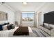 Bedroom featuring a large window with city views and neutral decor at 2479 Peachtree Ne Rd # 1703, Atlanta, GA 30305