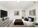 Bright bedroom featuring contemporary artwork and minimal decor at 2479 Peachtree Ne Rd # 1703, Atlanta, GA 30305