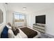 Bedroom featuring a large window with city views and neutral decor at 2479 Peachtree Ne Rd # 1703, Atlanta, GA 30305