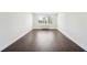 Spacious, empty bedroom boasting dark hardwood floors and a bright, modern aesthetic at 2479 Peachtree Ne Rd # 1703, Atlanta, GA 30305