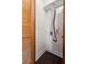 A functional laundry space featuring wood door, wood-look flooring, and laundry hookups at 2479 Peachtree Ne Rd # 1703, Atlanta, GA 30305