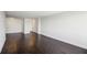 Open-concept living room with dark hardwood floors and modern fixtures at 2479 Peachtree Ne Rd # 1703, Atlanta, GA 30305