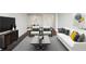 Bright living room with white sofa, neutral rug, and modern decor at 2479 Peachtree Ne Rd # 1703, Atlanta, GA 30305