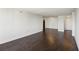 Spacious living room featuring dark hardwood floors and access to multiple rooms at 2479 Peachtree Ne Rd # 1703, Atlanta, GA 30305