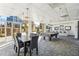 Spacious lounge featuring a pool table, dining area, and ample natural light at 2479 Peachtree Ne Rd # 1703, Atlanta, GA 30305