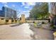 Inviting outdoor patio with seating, grills, and well-maintained landscaping at 2479 Peachtree Ne Rd # 1703, Atlanta, GA 30305