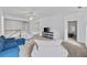 Large bonus room with carpet, seating, and a television, offering a flexible space at 6057 Glencedar Ln, Atlanta, GA 30349