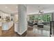 Open-concept living room with kitchen and stylish seating area at 6185 Masters Club Dr, Suwanee, GA 30024