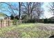Expansive backyard with a wooden fence and mature trees at 692 Moreland Se Ave, Atlanta, GA 30316