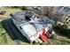Aerial view of a two-story home with a red and white painted exterior and unfinished landscaping at 692 Moreland Se Ave, Atlanta, GA 30316