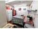 Interior view showcasing a refrigerator, table, and Coca-Cola vending machine at 692 Moreland Se Ave, Atlanta, GA 30316