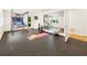 Basement fitness center with mirrors, sports equipment, and exercise mat for an active lifestyle at 1164 Bonview Ne Ln, Atlanta, GA 30324