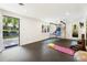 Basement fitness center with sports equipment and egress to backyard at 1164 Bonview Ne Ln, Atlanta, GA 30324