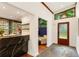 Bright foyer with stone floors leads to the kitchen and living areas, offering great flow at 1164 Bonview Ne Ln, Atlanta, GA 30324