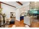 Spacious living room with access to kitchen and views of the outdoor living spaces at 1164 Bonview Ne Ln, Atlanta, GA 30324