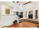 Stylish living room with hardwood floors that opens up to kitchen and bar area at 1164 Bonview Ne Ln, Atlanta, GA 30324