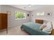 Bright bedroom with neutral tones, carpet, and large window allowing plenty of natural light at 449 Clairemont Ave # H3, Decatur, GA 30030