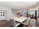 Elegant dining area with stylish seating, adjacent to the open living space at 1967 Cogar Dr, Decatur, GA 30032