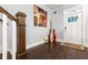 Welcoming foyer featuring hardwood floors, staircase and stylish decor at 1967 Cogar Dr, Decatur, GA 30032