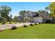 Beautiful two-story home with lush green lawn and a spacious driveway at 1967 Cogar Dr, Decatur, GA 30032