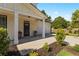Inviting front porch with elegant columns and well-maintained landscaping at 1967 Cogar Dr, Decatur, GA 30032