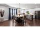 Modern kitchen with dark wood floors, stainless appliances, and large marble-top island at 1967 Cogar Dr, Decatur, GA 30032