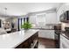 Modern kitchen featuring white cabinetry, stainless appliances, and a center island at 1967 Cogar Dr, Decatur, GA 30032