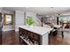 Bright kitchen with stainless appliances, large island with wood drawers, and open floor plan at 1967 Cogar Dr, Decatur, GA 30032