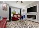 Comfortable living room with a contemporary fireplace and large TV at 1967 Cogar Dr, Decatur, GA 30032