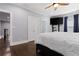 Open bedroom area shows hardwood floors, nice white trim, and doorway views to other rooms at 1967 Cogar Dr, Decatur, GA 30032